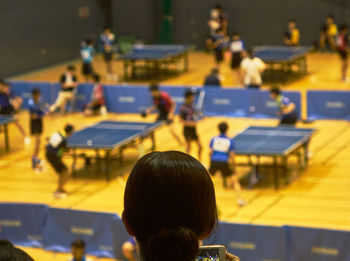 High angle view of table tennis tournament in arena