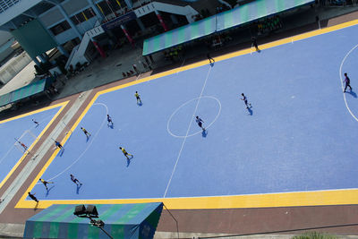High angle view of men playing soccer