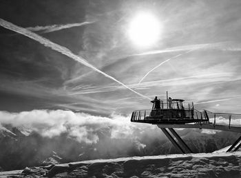 Scenic view of vapor trails in sky