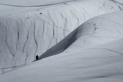 A lost man looks for signal in the mountains