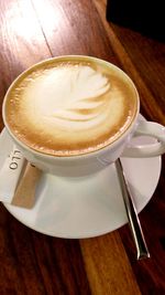 Close-up of cappuccino on table