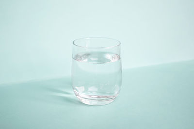 Close-up of water glass on table