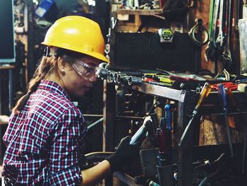 Female worker working at workshop