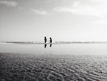 Two people on beach