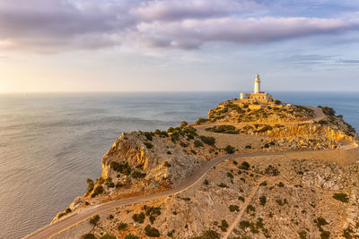 Scenic view of sea and building against sky