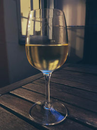 Close-up of wineglass on table