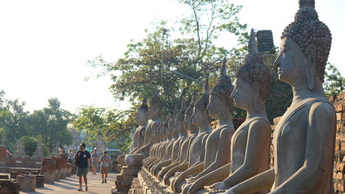 Statue in a row