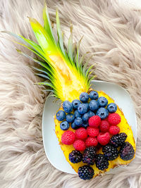 High angle view of strawberries on table