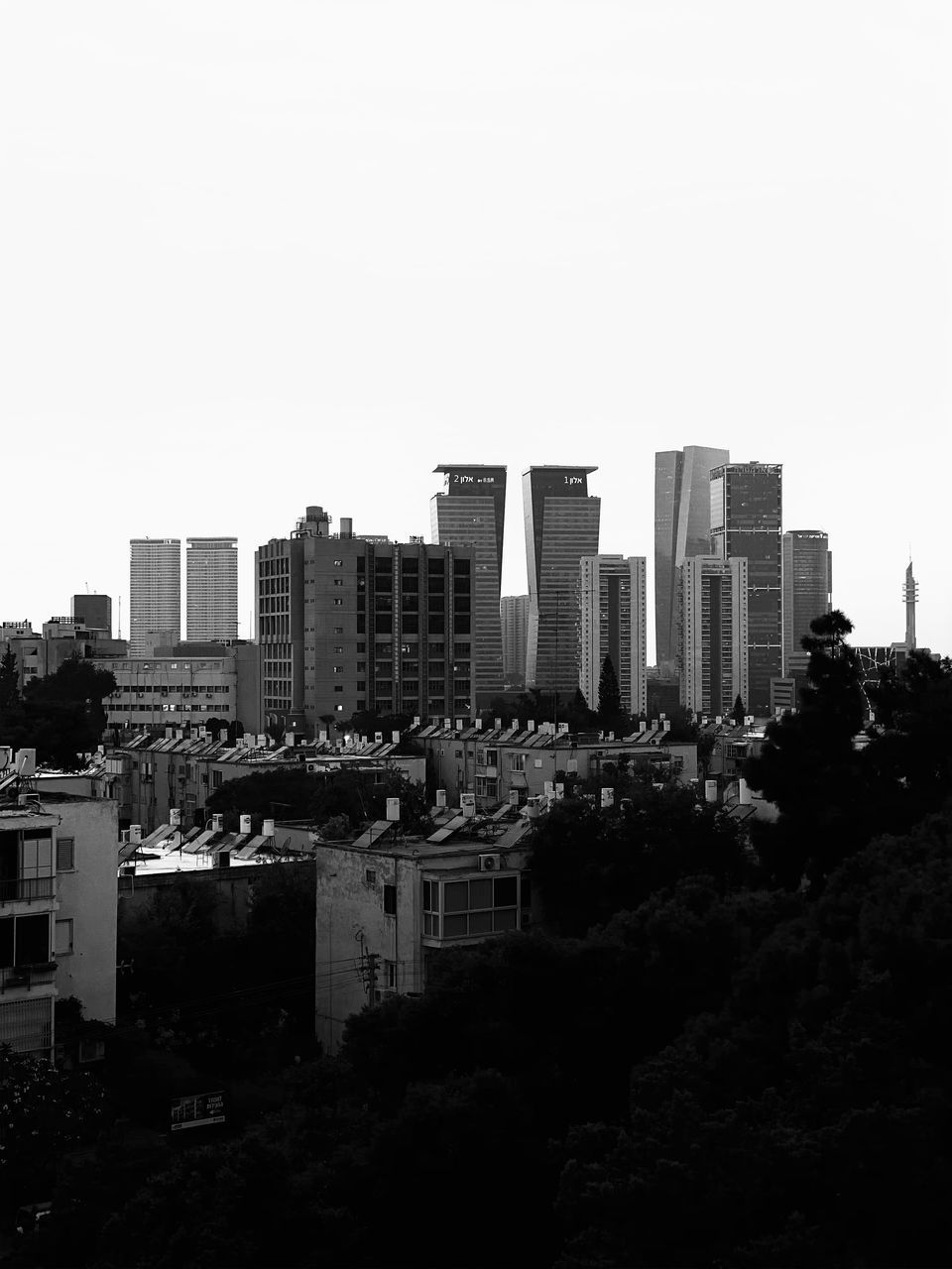 BUILDINGS AGAINST CLEAR SKY