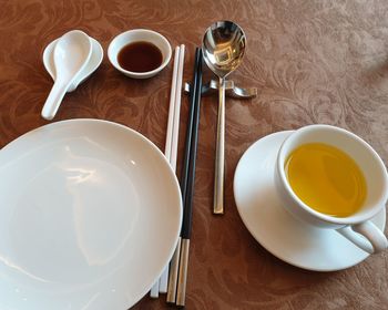 High angle view of empty coffee cup on table