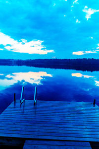 Reflection of trees in calm lake