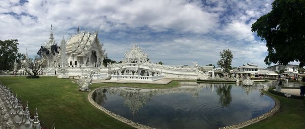 Panoramic view of lake against cloudy sky