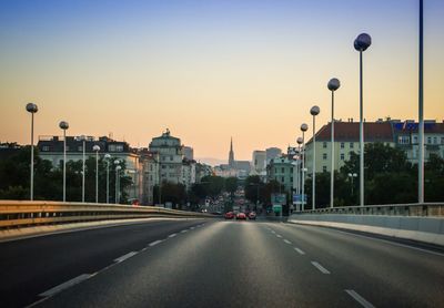 Street in city against clear sky