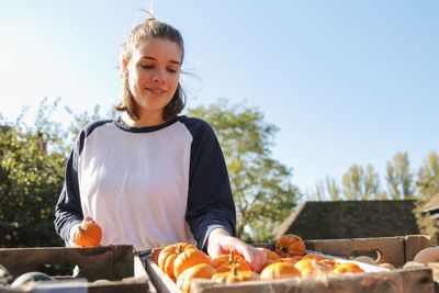 Portrait of a smiling girl holding food