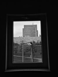 Modern buildings seen through window