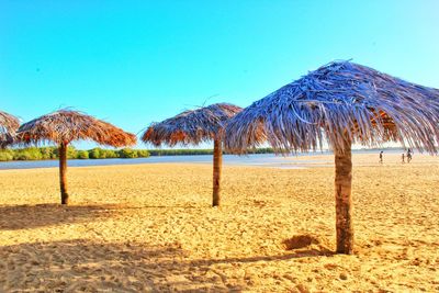 Panoramic view of beach against clear sky