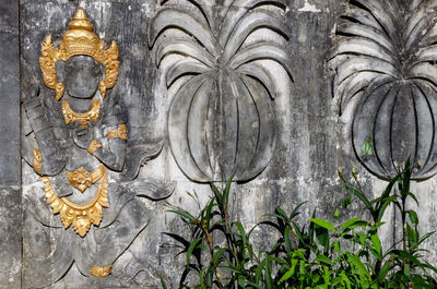 Close-up of carvings on stone wall