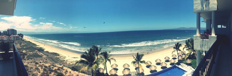 Panoramic view of beach against sky