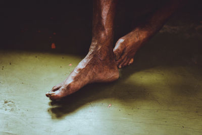 Low section of man on floor