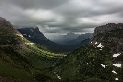 Scenic view of mountains against sky at night