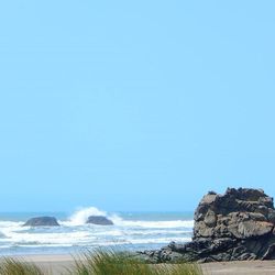 Scenic view of sea against clear sky