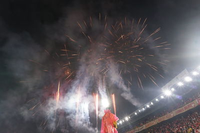 Firework display at night