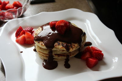 Close-up of pancakes served on plate