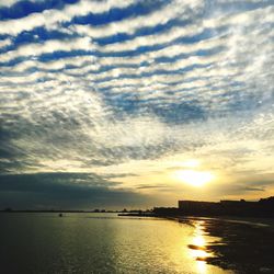 Scenic view of sea against dramatic sky