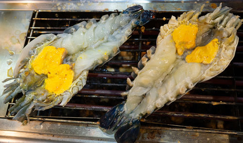 Close-up of meat on barbecue grill