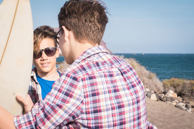 Young couple kissing on beach