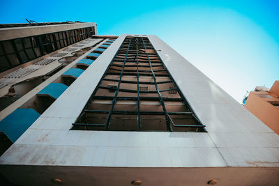 Low angle view of modern building against clear sky