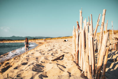 Scenic view of beach against clear sky