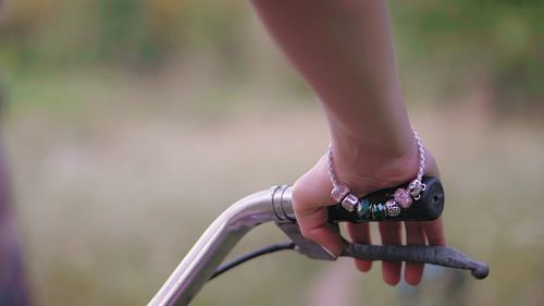 Low section of person wearing bicycle