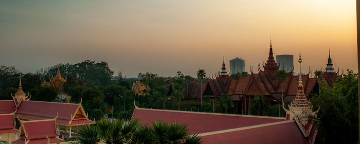 High angle view of buildings against sky during sunset