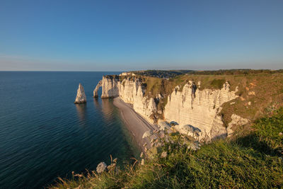 Panoramic view of sea against clear sky in the evening to alabaster coast, Étretat, normandie. 