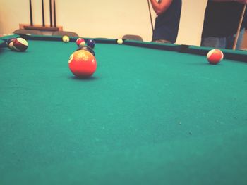 Close-up of man playing with ball