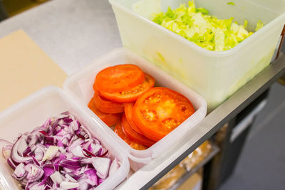 High angle view of chopped vegetables in bowl on table