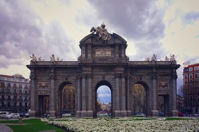 View of historical building against cloudy sky