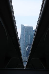 Low angle view of modern buildings against sky