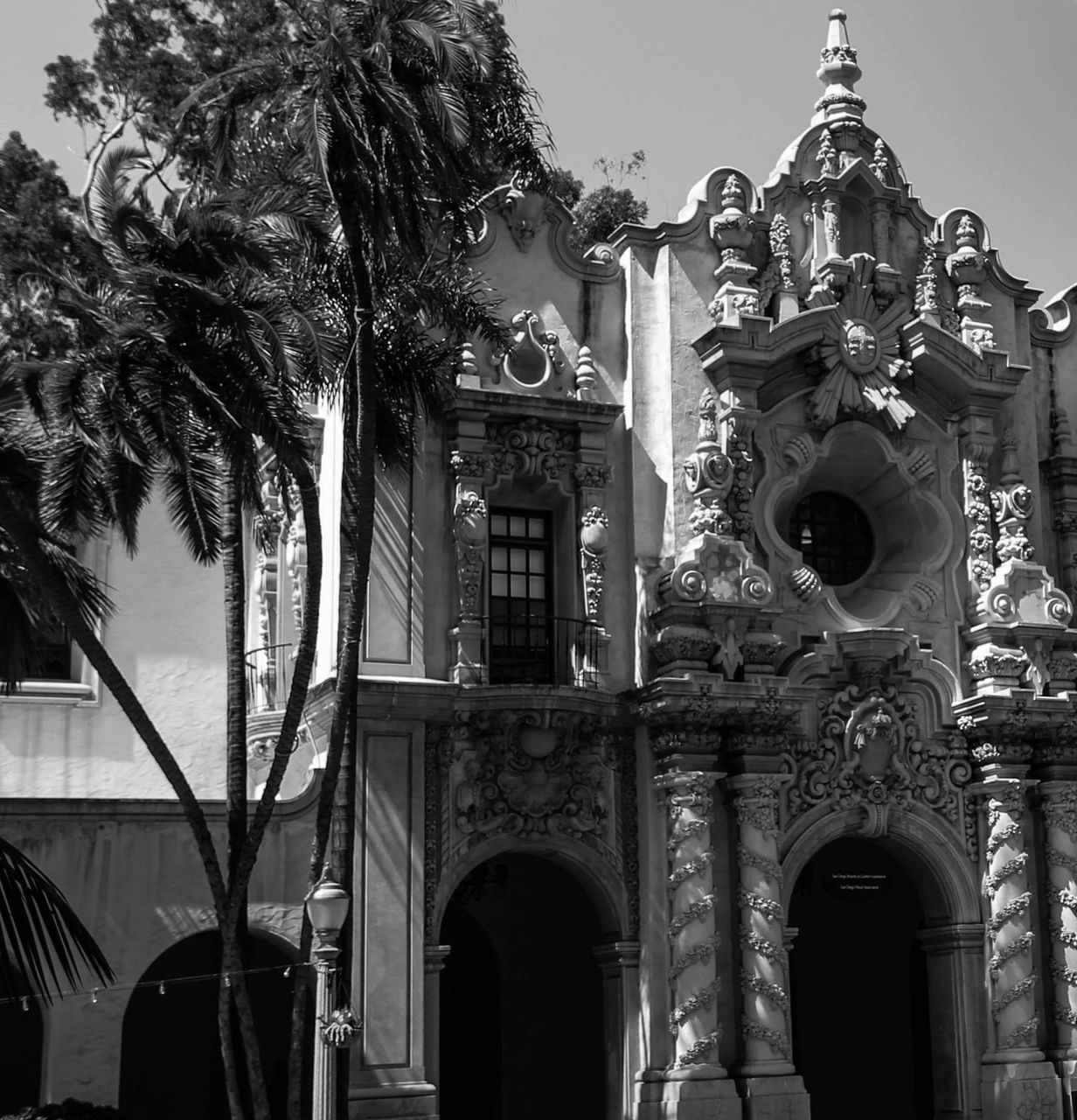 architecture, built structure, building exterior, tree, arch, facade, place of worship, entrance, church, outdoors, sky, architectural column, day, architectural feature, no people, exterior, high section