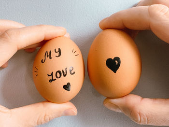 Cropped hand of person holding easter egg