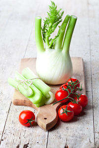 High angle view of vegetables on cutting board