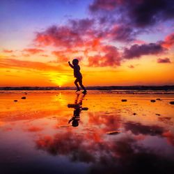 Scenic view of sea at sunset