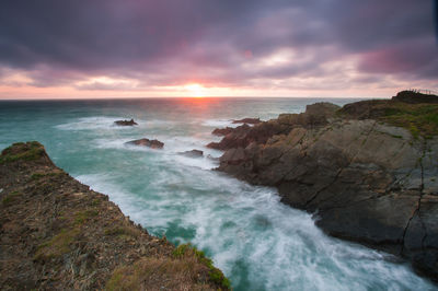 Scenic view of sea against sky during sunset