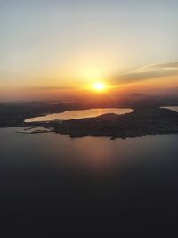 Scenic view of sea against sky during sunset