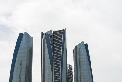 Low angle view of modern buildings against sky