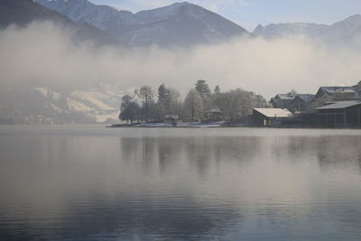 Scenic view of misty lake 