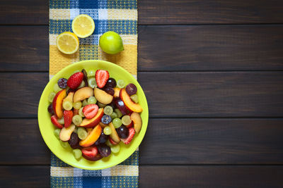 High angle view of fruits in bowl on table