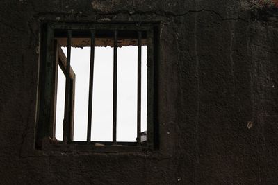 Low angle view of window in old building