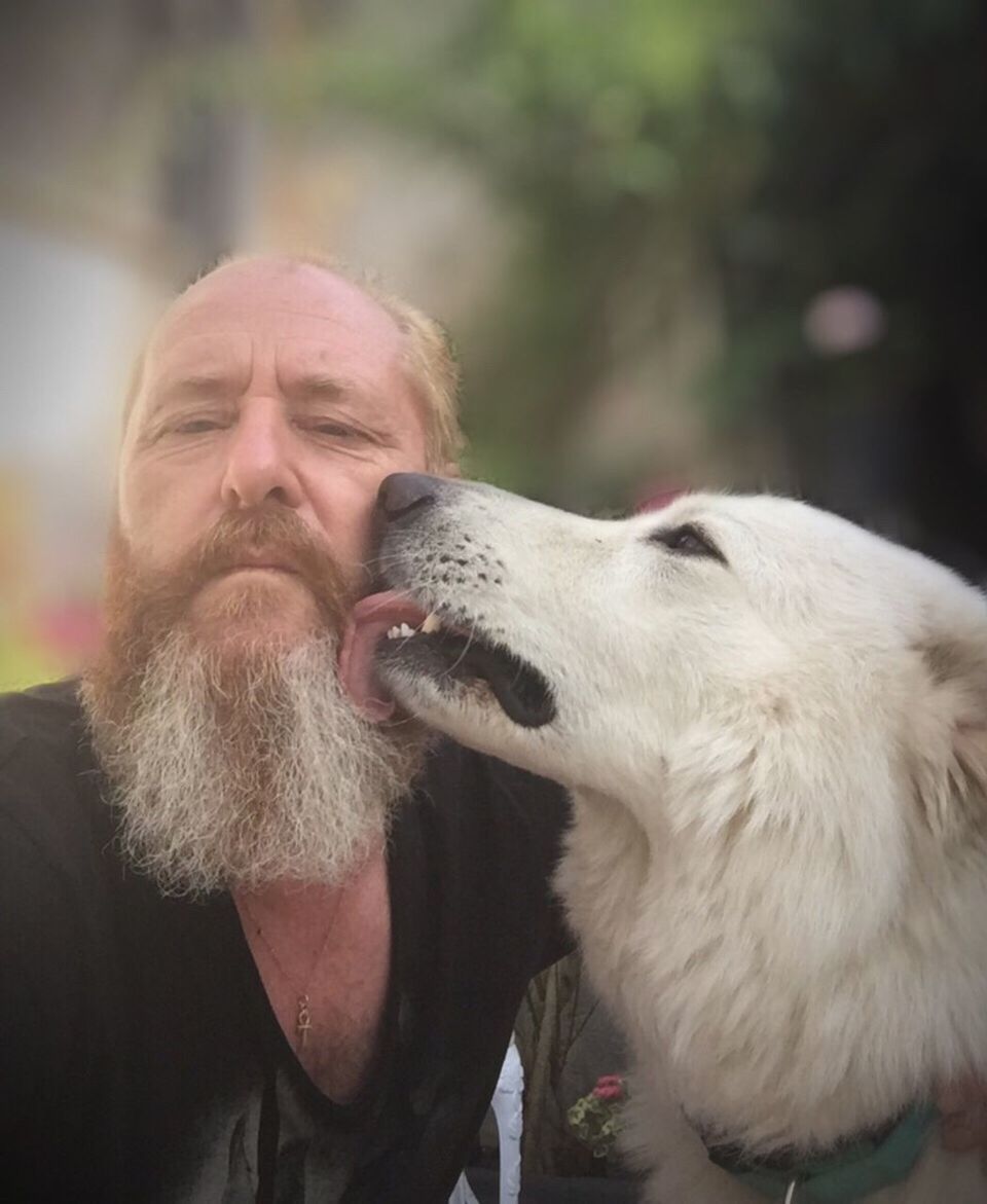 beard, one animal, domestic animals, one person, one man only, pets, animal themes, livestock, dog, adults only, mammal, senior adult, people, portrait, only men, outdoors, close-up, day, adult, vet